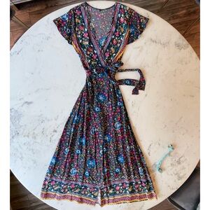 Worn On TV Judy Hale’s boho wrap dress from Dead to Me season 2